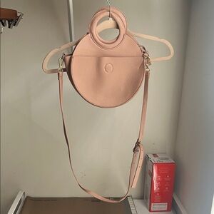 Urban Outfitters Round Pebbled Leather Crossbody Bag in Blush